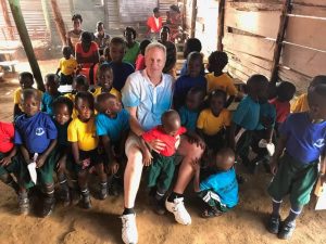 Rob VanHoose and some of his new friends in Uganda.